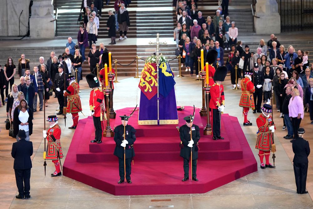 Scottish Secretary Alister Jack (front left) and Secretary of State for Defence Ben Wallace (front right) in ceremonial role as members of the Royal Company of Archers guard the coffin of Queen Elizabeth II